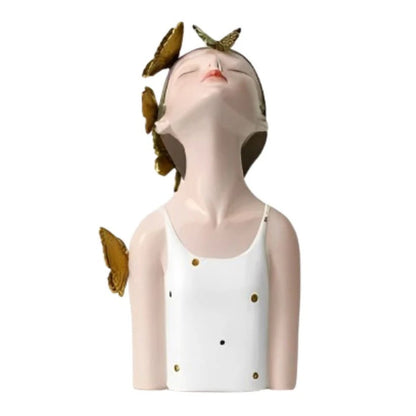 Bella Butterfly doll sculpture in polka dots